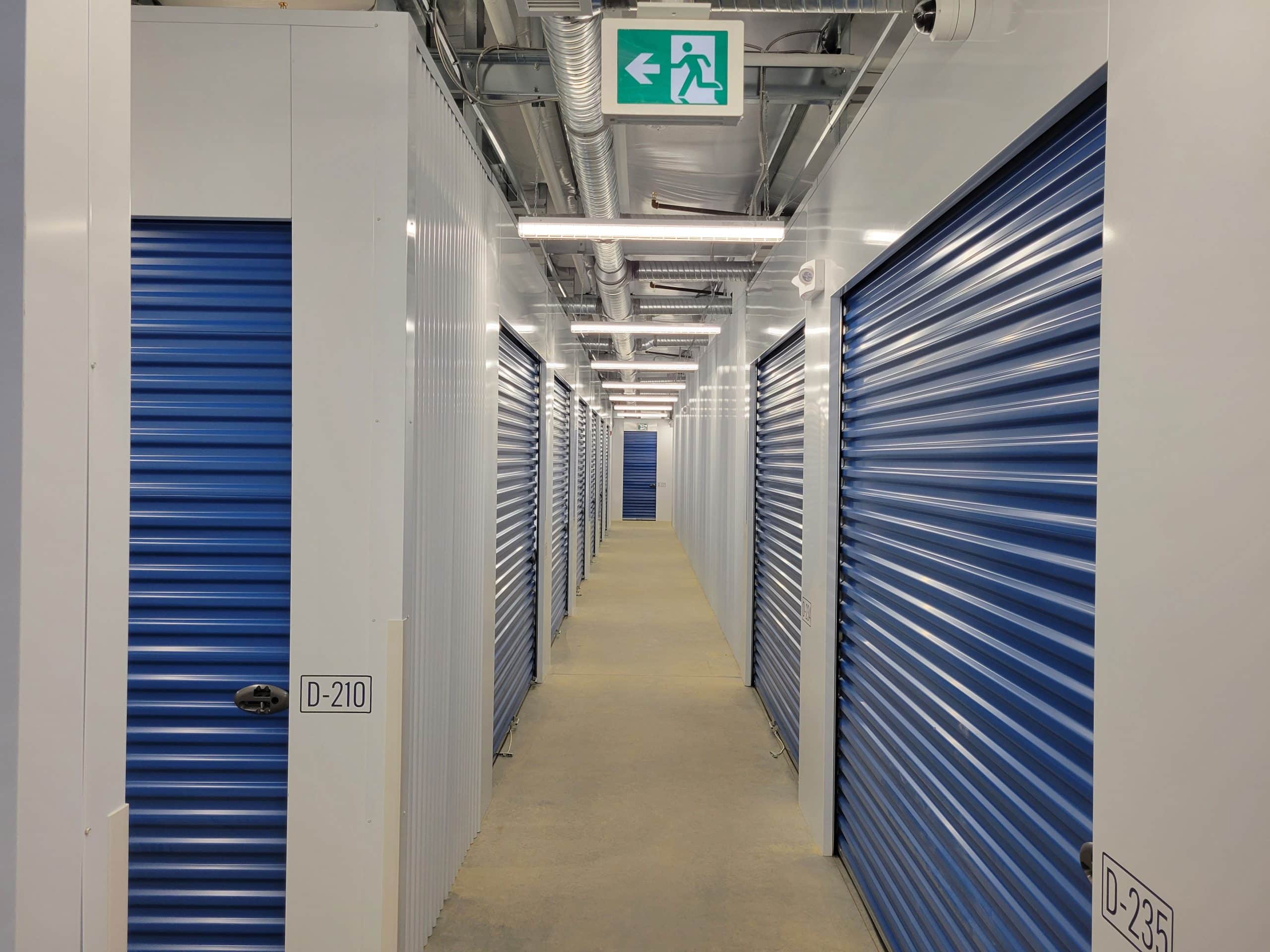 Well-lit interior hallway with secure storage units at All Access Storage Parksville