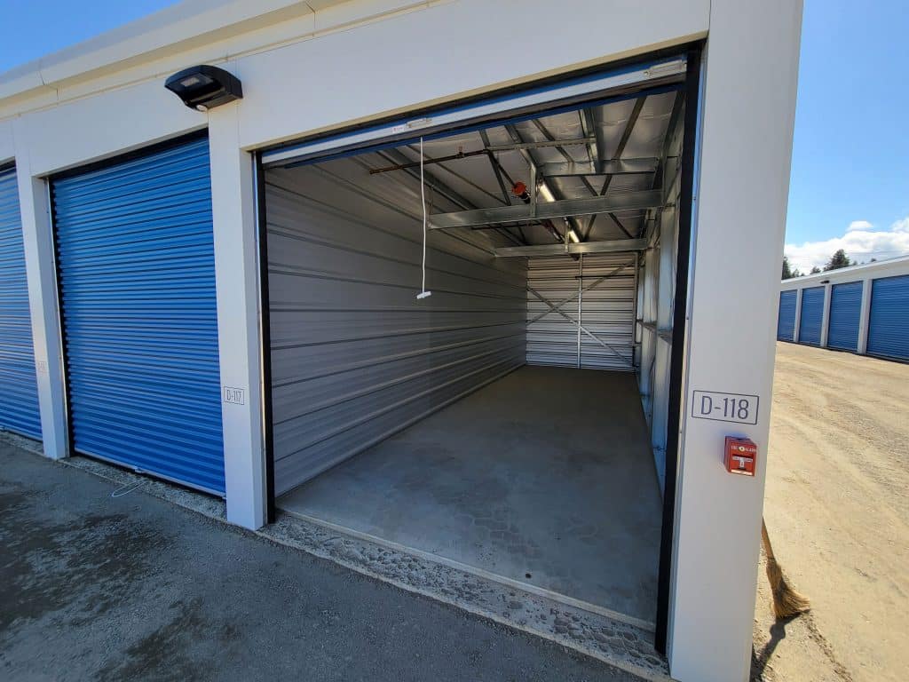 Clean, empty storage unit with roll-up door at All Access Storage Parksville.